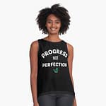 Woman wearing a Progress not Perfection Pilates T-Shirt