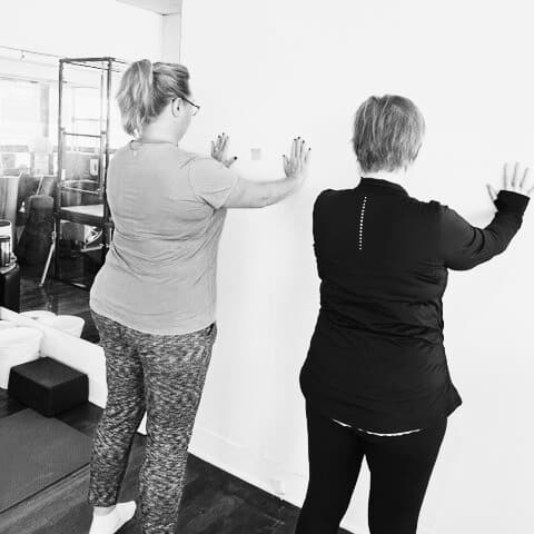 SOLO - Private Pilates 2 woman doing a private pilates session