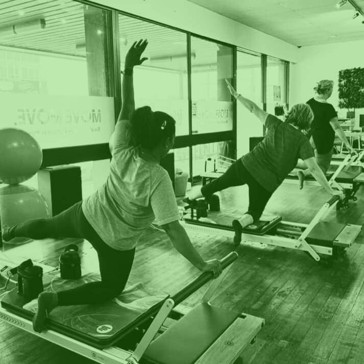 women doing a reformer pilates class