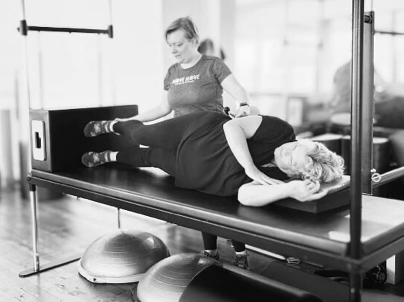 lou conyers teaching pilates to a woman over 50 in melbourne