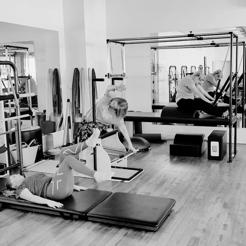 mother and daughters doing a neuro pilates class at move move pilates studio bentleigh east