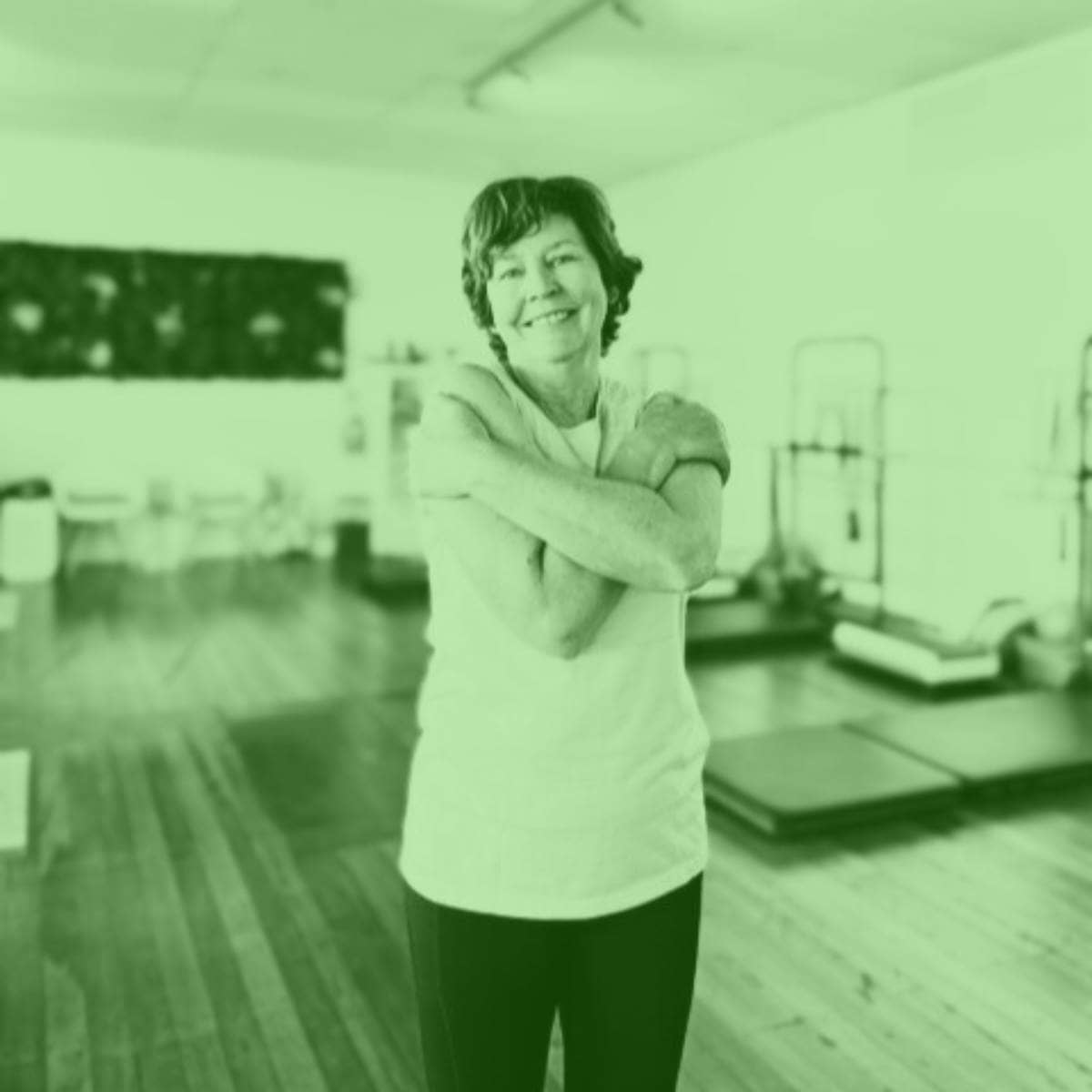 Smiling woman at Pilates on International Womens Day